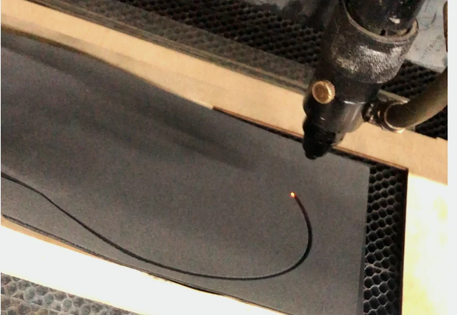 Laser cutting a top cover